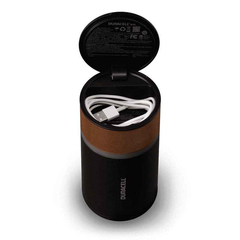 Image of the product with the lid up and cord storage compartment shown.