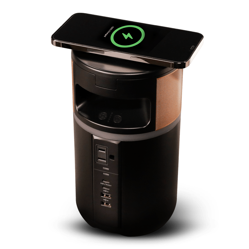 Image of the power station with a phone wirelessly charging on top.