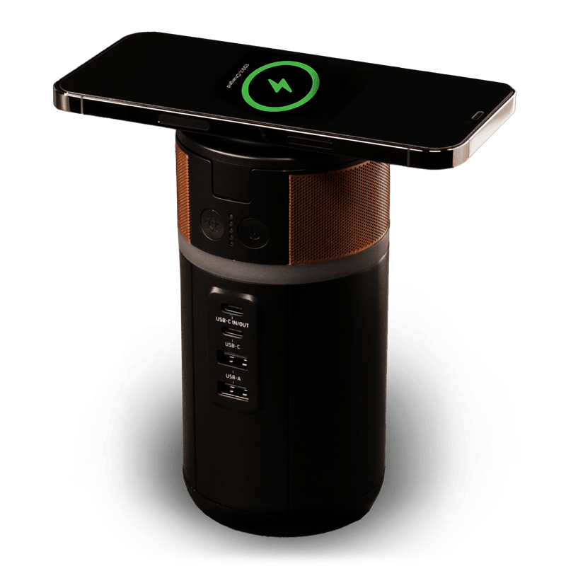 Image of the power station with a phone wirelessly charging on top.