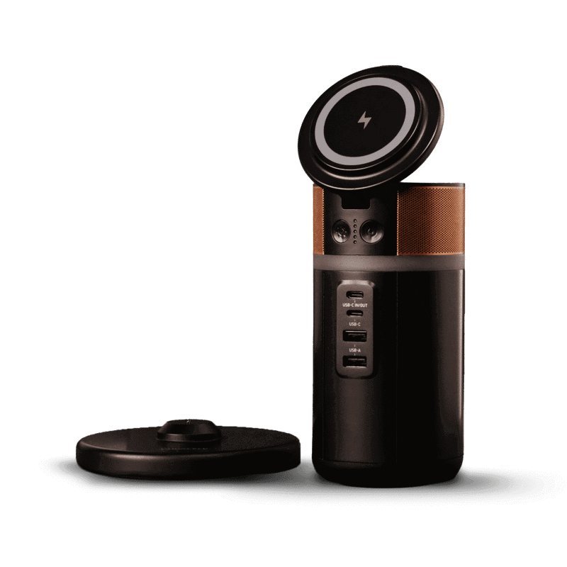 charging dock and the M150 portable power bank charger with a phone wirelessly charging on top and the lid tilted up