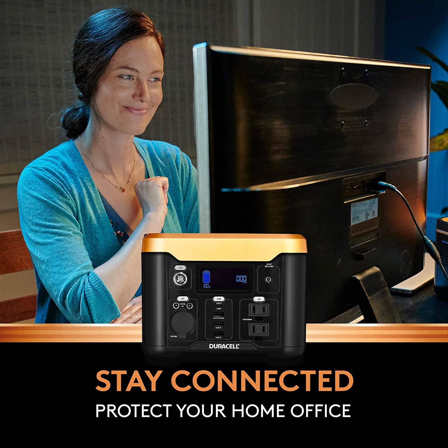 Image of a woman who is able to work on her computer in a power outage thanks to her power station.