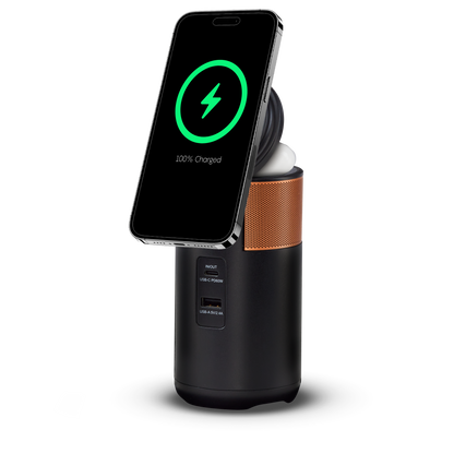 Duracell M100 portable charging hub with the tiltable lid up and a smartphone charging on it